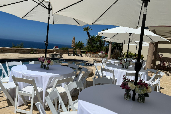 Elegant table setup with party event equipment rentals for a wedding reception in Los Angeles.