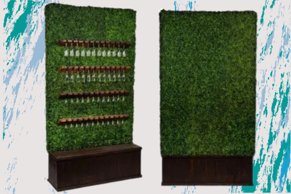 Greenery hedge wall with champagne bottle holders—ideal for upscale party event equipment rentals, decorative event setup, and delivery in Los Angeles.
