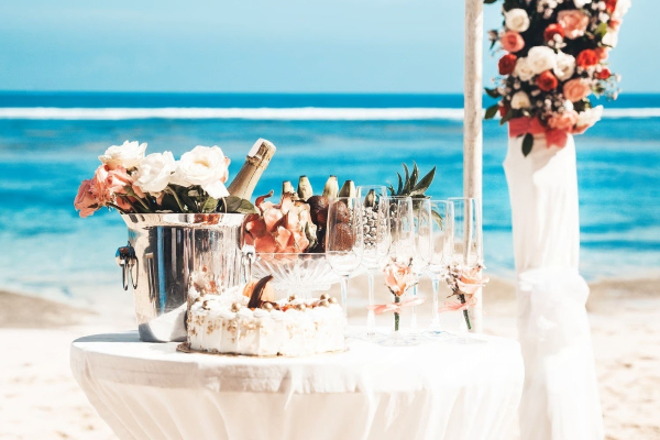 Party event equipment rentals including tables, chairs, umbrellas, speaker, and lounge furniture setup for delivery in Los Angeles.