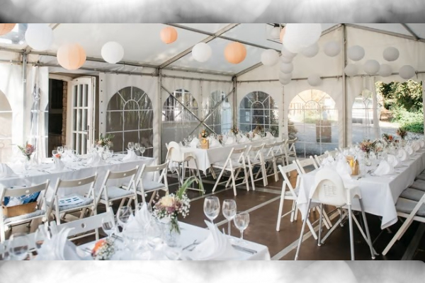 Various party event equipment rentals including tables, chairs, umbrellas, speaker, and lounge furniture setup for delivery in Los Angeles.